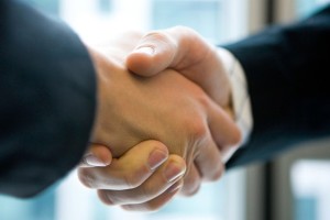Hands shaking partnership